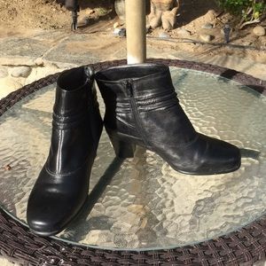 Black leather ankle boots.